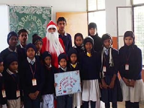 Happy children receive gifts from Santa Clause