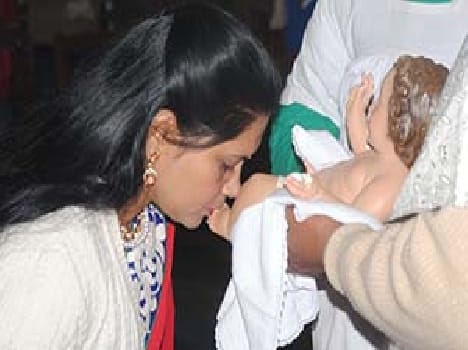 Kissing the feet of Jesus Christ descended Prrbhu