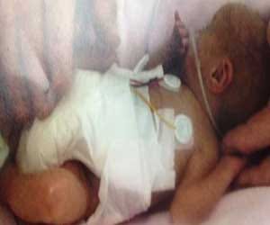 baby born whose size equals to a toothbrush