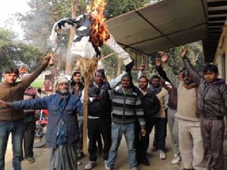PK movie blew burn effigy in protest and rural students .