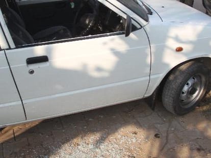 group of young man broke glass of 17 car