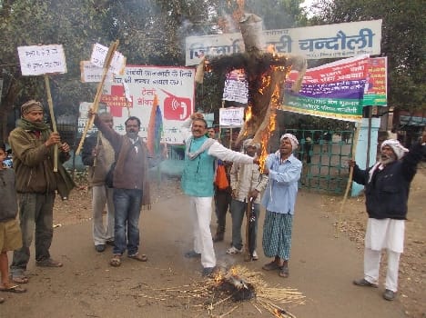 Seven arrested in burn effigy