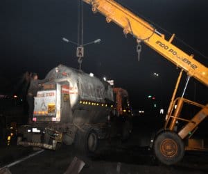 Oxyzen Tanker Inverted on Road after Hitting Car