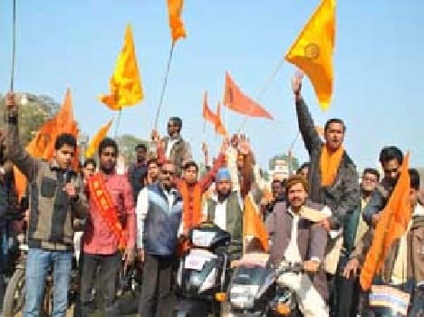 VHP activists bike out processions .