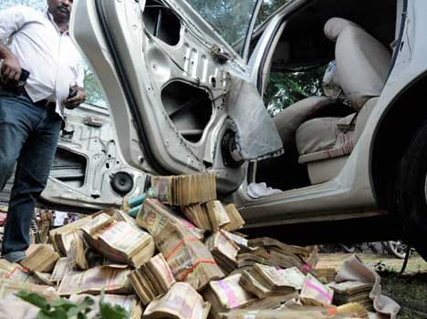 Rs three crore note scattered on the road