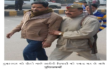 trader beat by a policeman