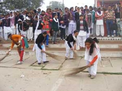 give hygiene message by cleaning the Gangaghat