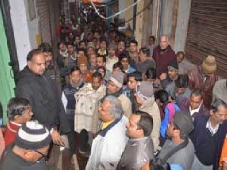 People protest when electric connection cheaking by team