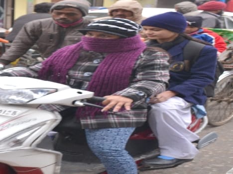 Weather harsh attitude , people trembled with severe cold wave