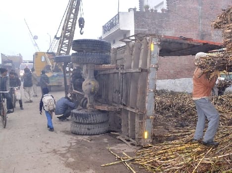 sugercane truck dump in railway crossing