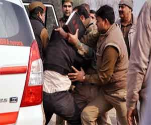 family beaten by police.