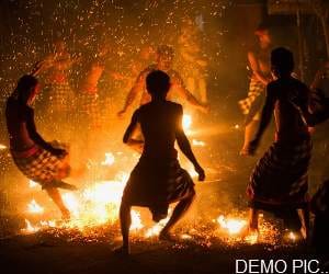 dance on the fire on the eve of sadyala festival in kullu.
