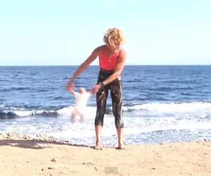 Lena Fokina continue swing yoga to new born kid 
