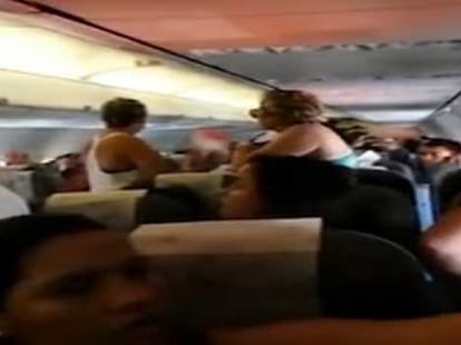 passengers opened up emergency exit of plane
