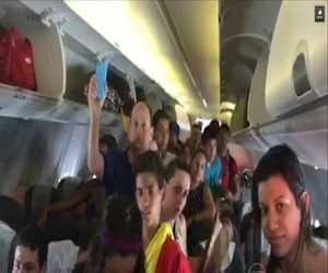 passengers opened up emergency exit of plane