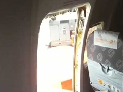 passengers opened up emergency exit of plane