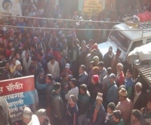 people protest on businessman murder.