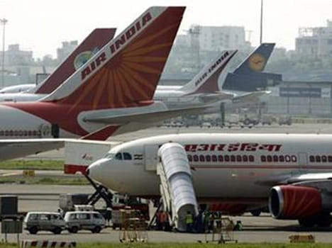 Two Air india employees held in human trafficking.
