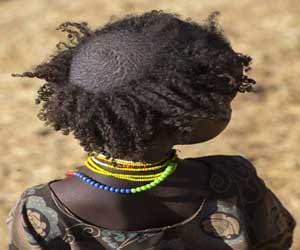 tribe were women head are tonsured until they marry