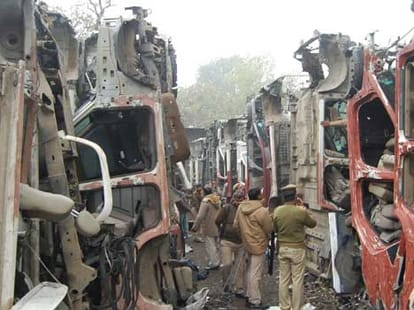 police raid on looted vehicles godown.
