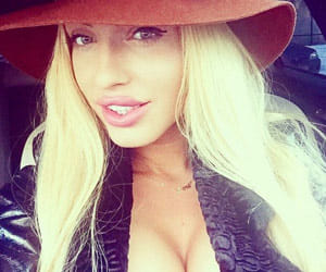 Playboy model's father killed himself after looking nude photos