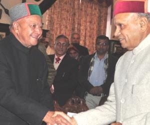 cm virbhadra singh and dhumal meet at rajbhawan.