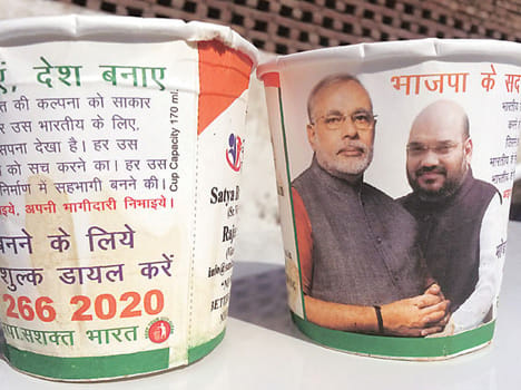 cups have narendra modi and amit shah photos in train 