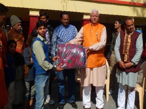 Distributed blankets to the poor