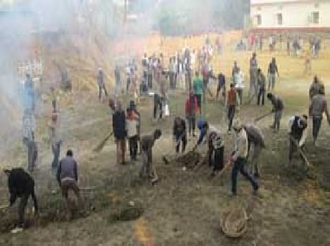Cleaning Ganga Ghat of devotees