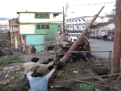 Electric pole planted in pits