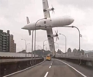 At least 25 dead as Taiwan plane plunges into river