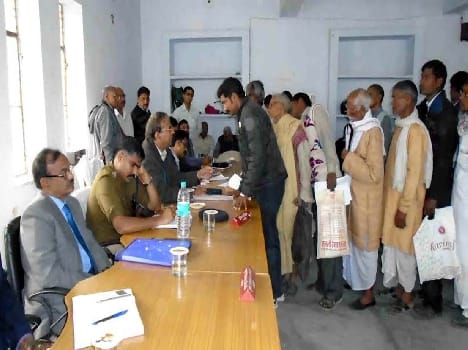 Cut a day's salary of twelve officers