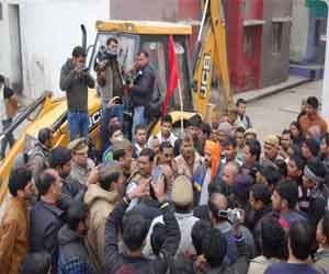 Siddharth Vihar Colony remove religious site furore.