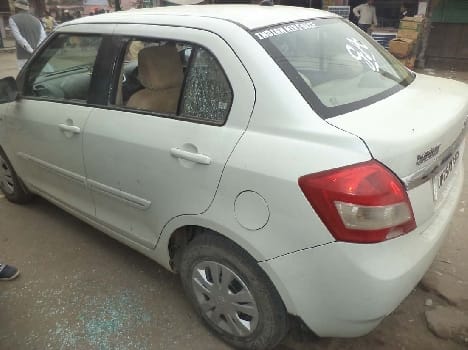 Car glass broken laptop  And records flown
