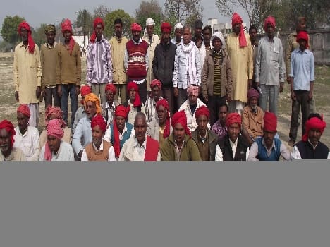 Watchman sitting on dharna in support of their demands .
