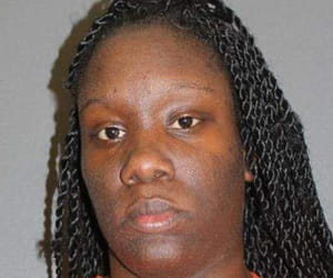 bag of heroin falls from woman's bra