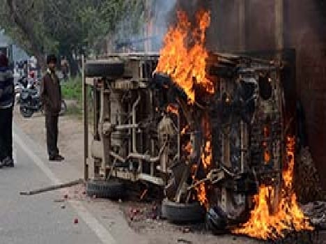Arson and stone throwing on the death of two students