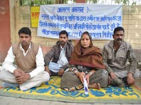 The leader of the ruling party accused of land grabbing charges