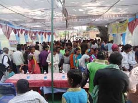 The thronging crowd of villagers protesting camp outs