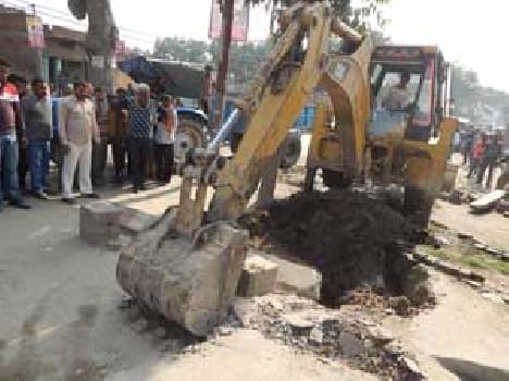 Thundered bulldozers , road was widened