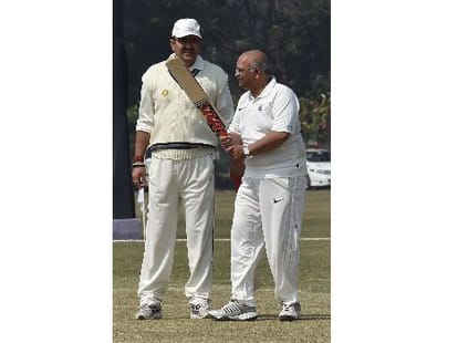 Cricket match between CM 11 and IAS 11.