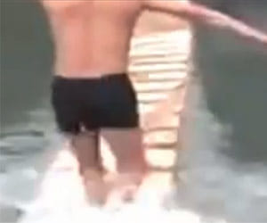 A Shaolin monk is sprinting on water