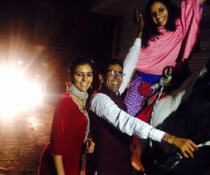 unique marriage, daughter sit at horse