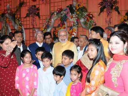 PM Narendra Modi joins family function of Mulayam Singh Yadav.