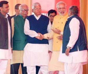 PM Narendra Modi joins family function of Mulayam Singh Yadav.