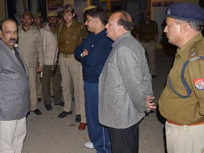 pregnent woman and husband beaten in police station.
