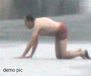 a person strips off in icici atm.