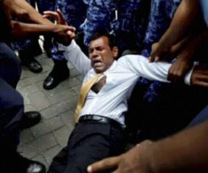 maldive police dragged to ex president into court.