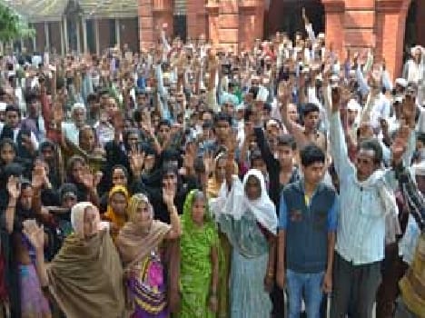 Demanding the removal of the land occupied by the cemetery
