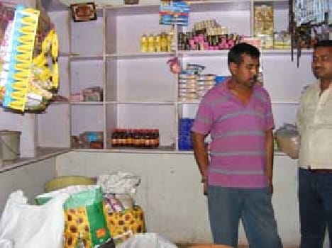 Ration shop and took away cash